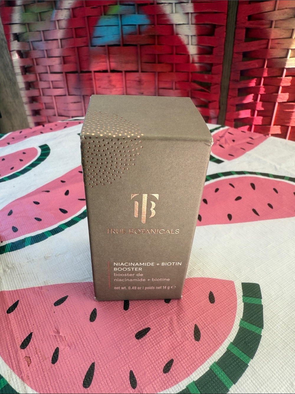 True Botanicals Niacinamide + Biotin Booster Serum in Brown Packaging